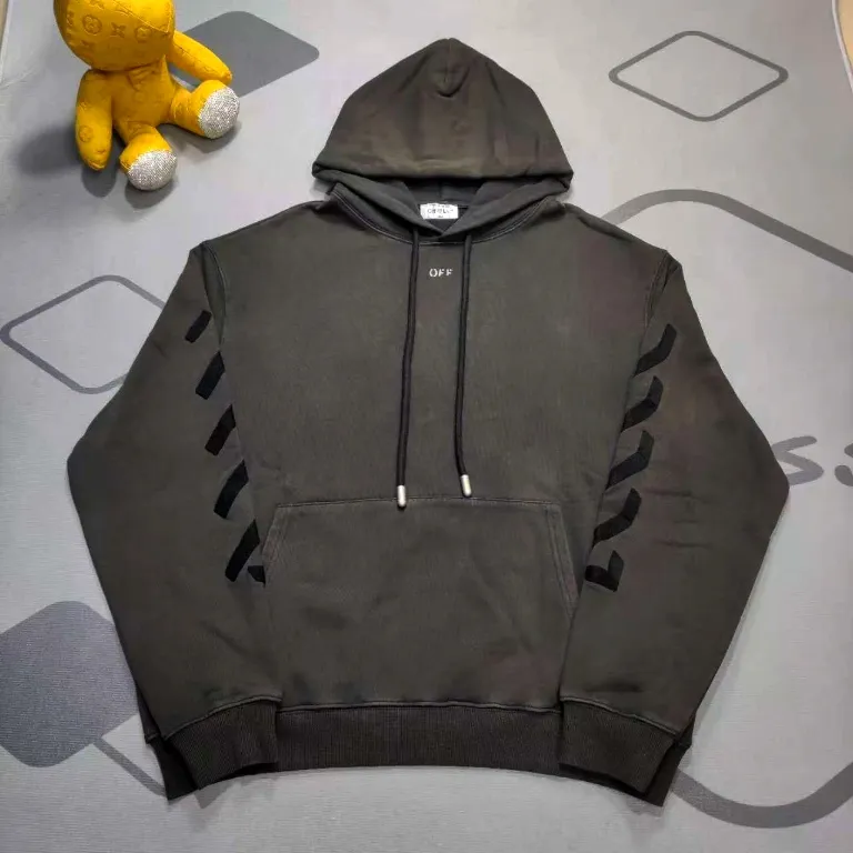 Top tested version OFF oil painting old man WHITE hooded sweatshirt OW jacket hoodie oversize same style for male and female couples celebrities. As a street fashion art in the luxury ranks, off white has always attracted many fans with its classic logo and trendy creativity. Not only is it an understanding of fashion, off white also intuitively reflects ♻️ environmental awareness in many works, and treats the world gently.  The kangaroo pocket adopts a special machine crimping process with externally shaped wiring. The brim of the hat is designed with threads, which is the first thing to look at when appraising.   The fabric is made of 480g terry cotton fabric with full drape.  Color: Black Size: XS-L P:430